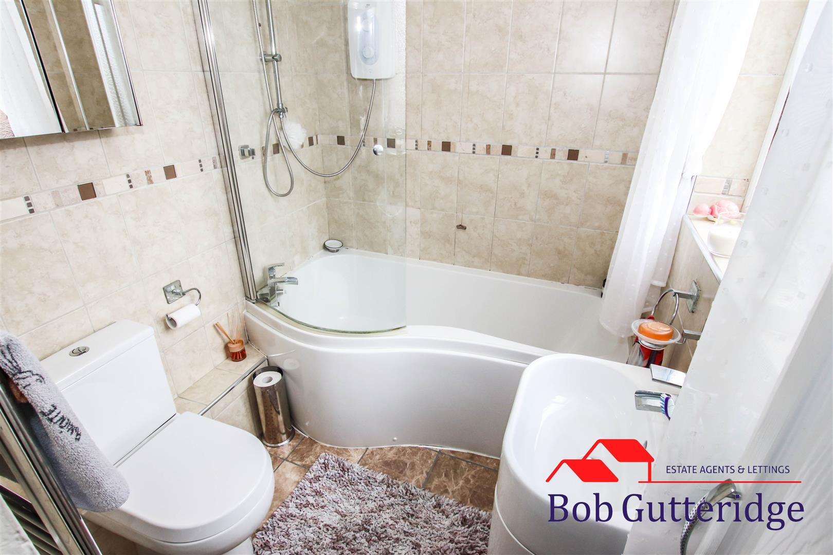 FULLY TILED BATHROOM
